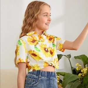 Matching sunflower crop top and shorts set.